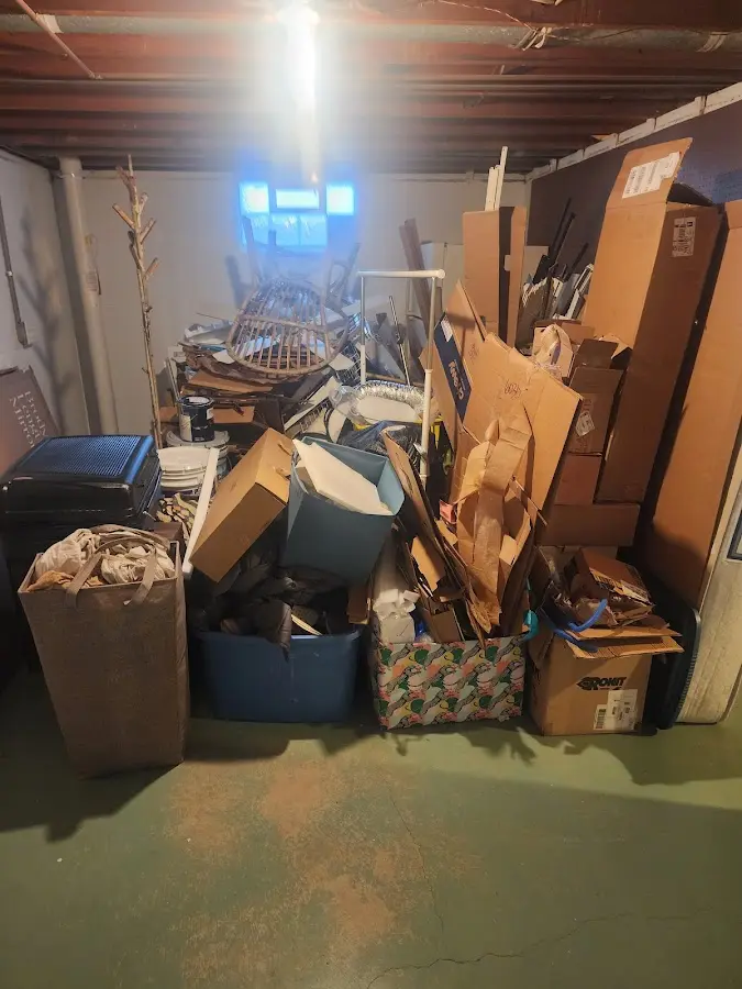 Roll-off dumpster container at job site for 20 Yard Dumpster Rental in Kennett